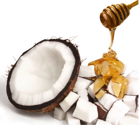 Coconut and honey spa pedicure treatment ingredients including fresh coconut, honey dipper, and coconut pieces used at Rubi Nail Spa